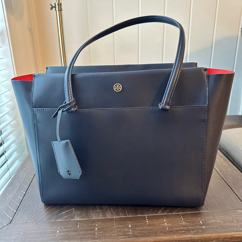 Used Tory Burch Parker tote. Navy blue, red interior.Excellent condition